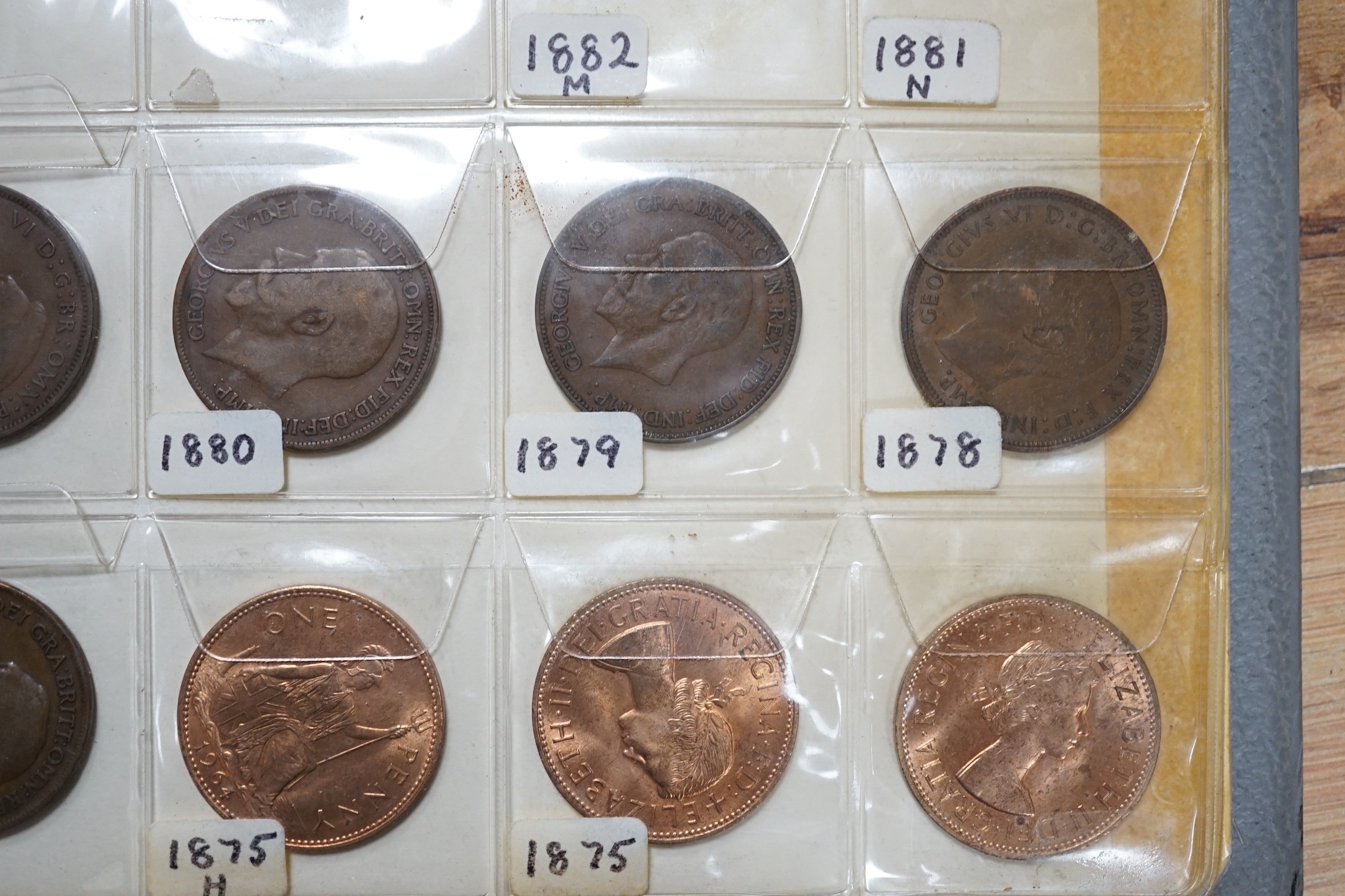 UK and World coins in a case and three albums